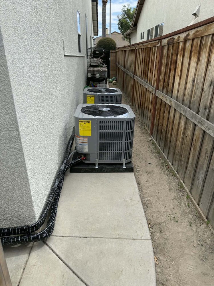 Dual condenser AC installation along side yard